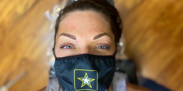 Close-up of a woman wearing a face mask